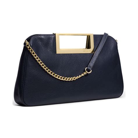 michael kors navy flat clutch|Michael Kors berkley clutch.